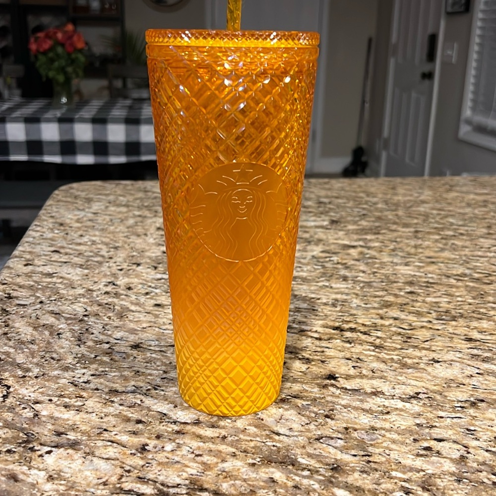 Orange Starbucks cup